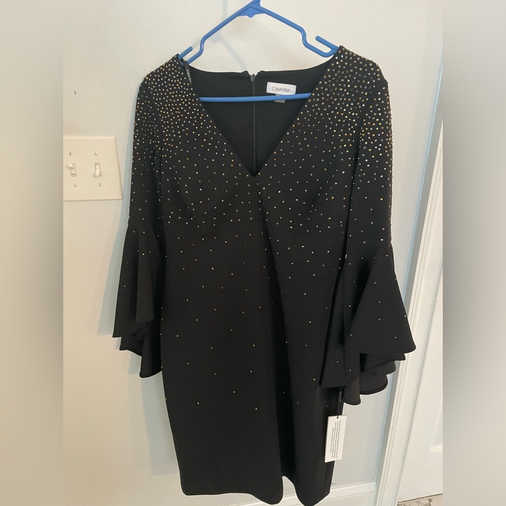 New with tags-Calvin Klein black dress with small gold and silver accent sequins